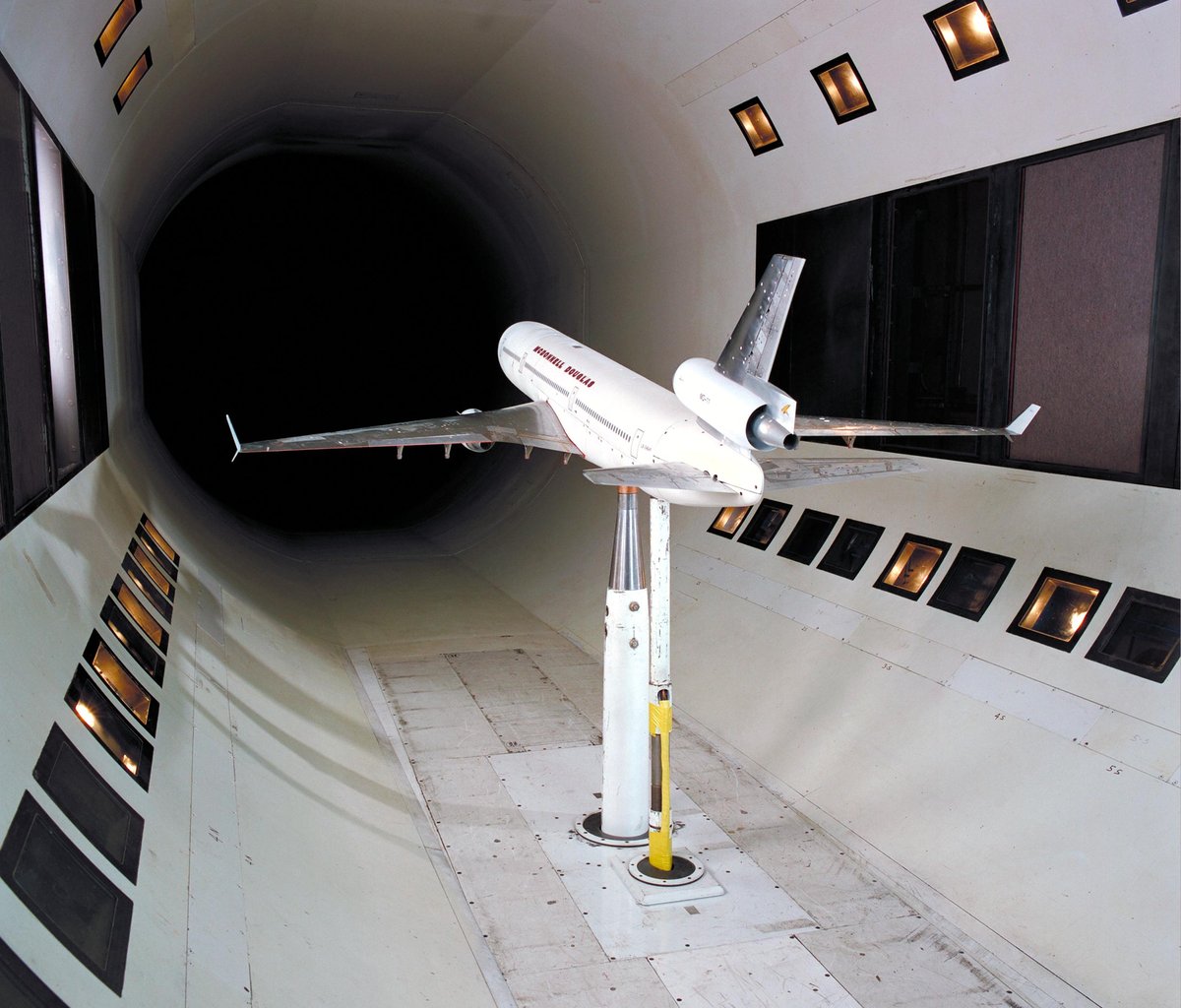 NASA wind tunnel with the scale model of an aeroplane.